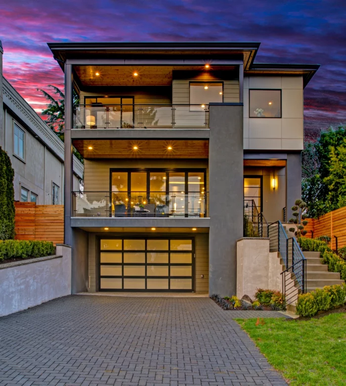 Luxury modern home exterior at sunset