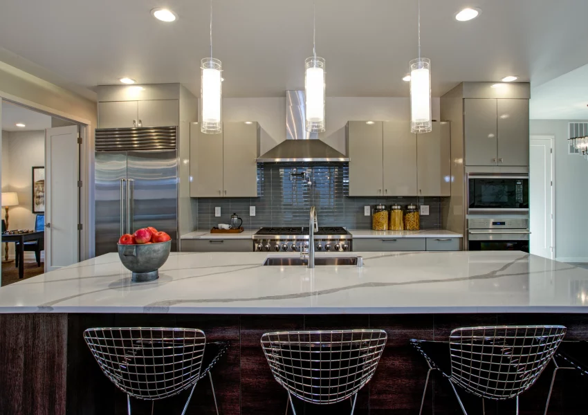 White and gray calcutta marble bathroom design.